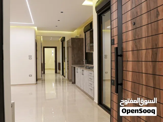 شقة للبيع تسوية 95م مع تراسات 150م (سكنية - استثمارية) في ديرغبار شارع ال 60 ، مطبخ راكب ، تدفئة غاز