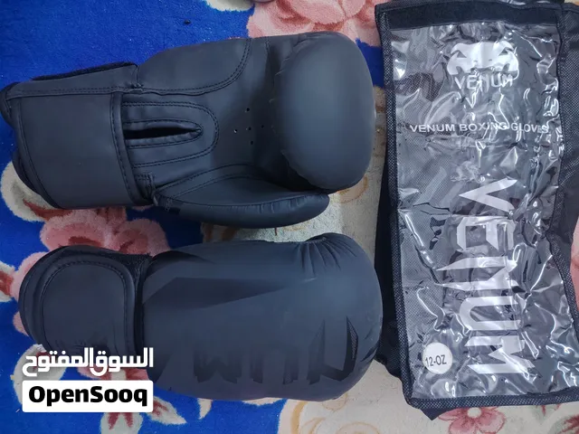 بوكس ملاكمه مع باندج وجهاز تنفس وحامي الاسنان وضامه العضله ومقوي ساعد