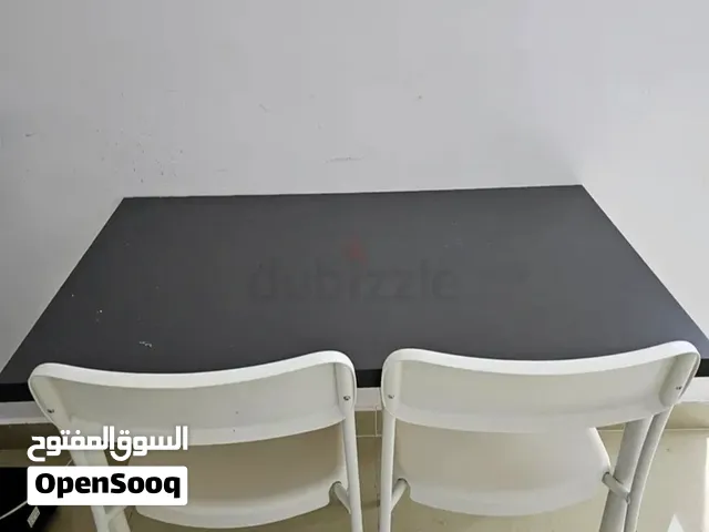 IKEA Dining Table + 2 Chairs  Compact Set  AED 150
