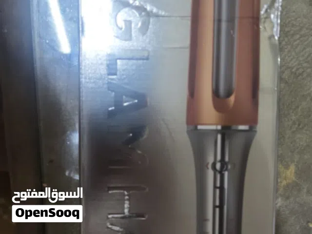 مكوهُ تجعيد الشعر جديدة