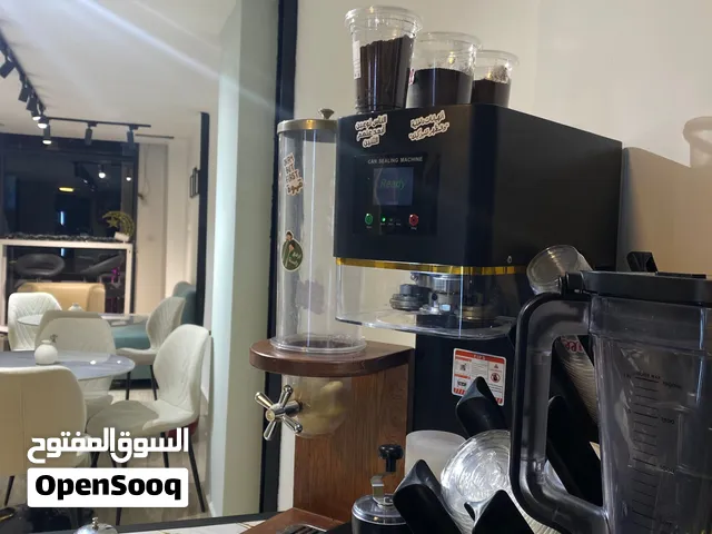 ماكنة كبس وتغليف علب المشروبات والقهوة