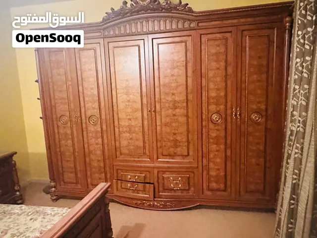 غرفة نوم + معيشة