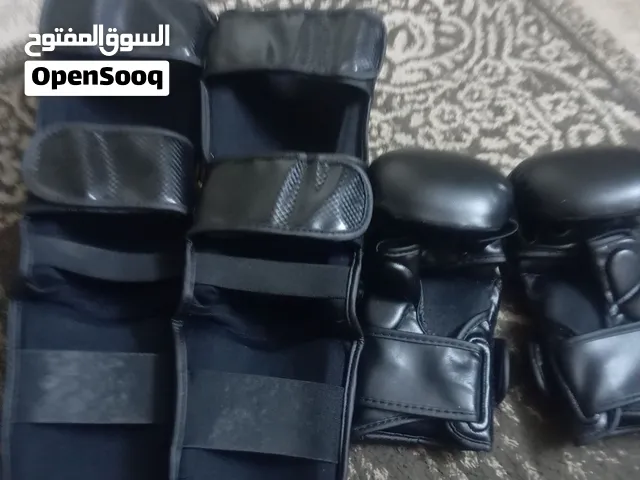 للبيع طقم قتال MMA احترافي ماركة Combat كامل (قفازات + واقيات ساق) بحالة ممتازة