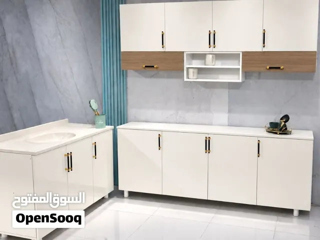 كاونترات خشب مترين ارضي وملحق مع سنك متر وعشرين مرمر 310