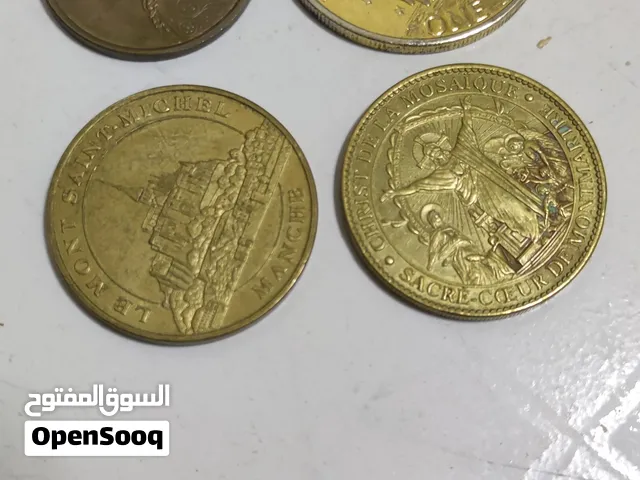 ميداليات ناذرة مع عملة ازنهاور