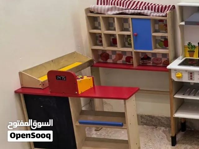 اسواق خشبي مع العاب خشبية