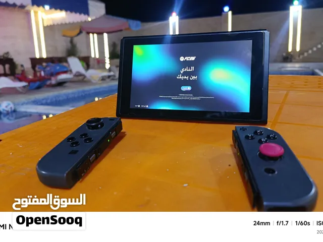 Nintendo switch v2 مهكر G512 مع قبضة كيم سير نوفا لايت 2  مع كامل اغراضو جاهز عل لعب