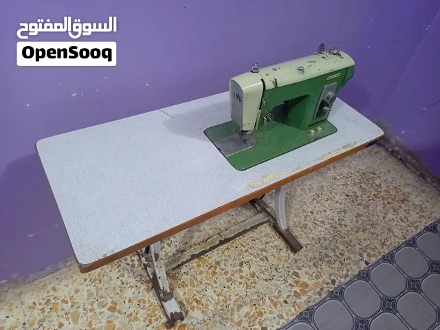 مكينة خياطة الملابس