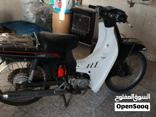okay it's a birdie Suzuki birdie original 90cc it is back wheel drive also this in good condition