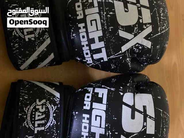 قفازات بوكسينق SPALL مقاس 14مستعمل مره واحده فقط في بطوله اوقست الوطنيه