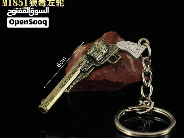 ميدالية جيمينج معدنية بتصميم مسدس مميز