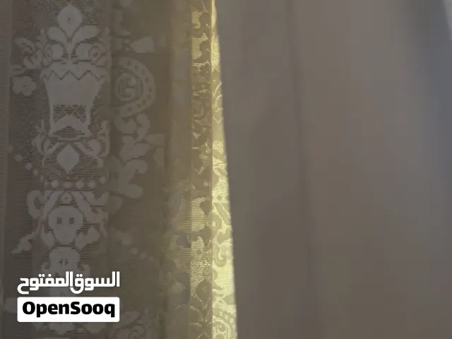 ستائر والاشرعه البيضاء