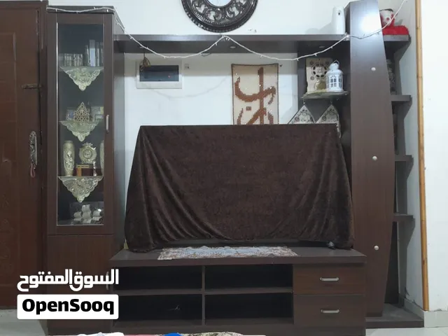 مكتبة تليفزيون lcd مودرن حتي شاشه 65 بوصه كامله باضاءه ليد وارفف زجاج لم تركب ورف خلفي لم يركب
