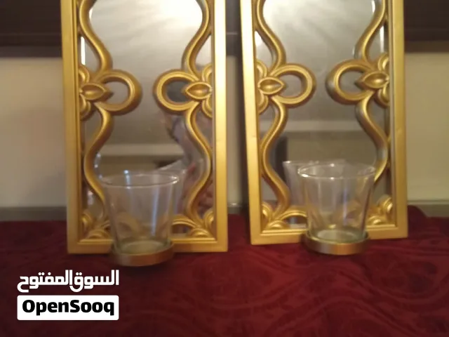 تعليقات حائط مع كأس للشموع شبه جديد 4 قطع