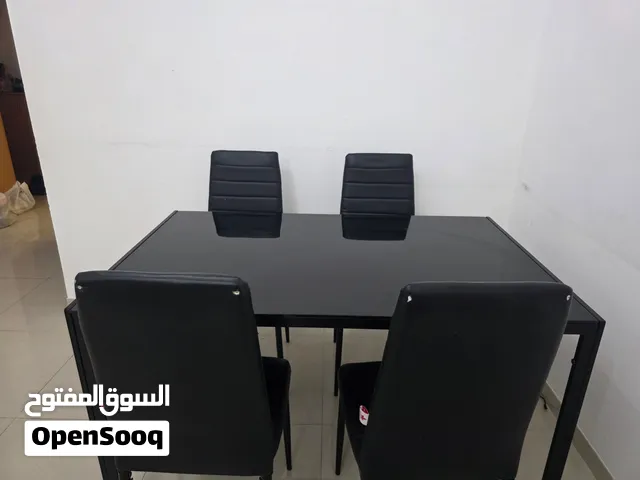 GLASS DINING TABLE WITH 4 CHAIRS