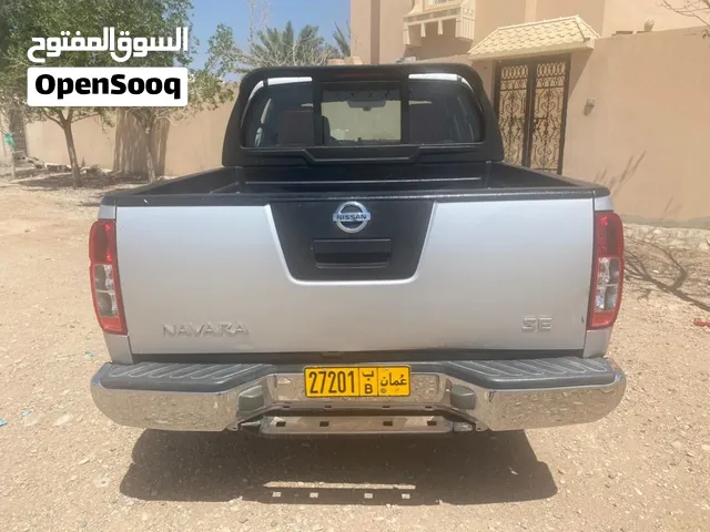 نيسان نافارا 2010 بيك اب رمادي مستعمل بحالة ممتازة مع تأمين وخلو حوادث