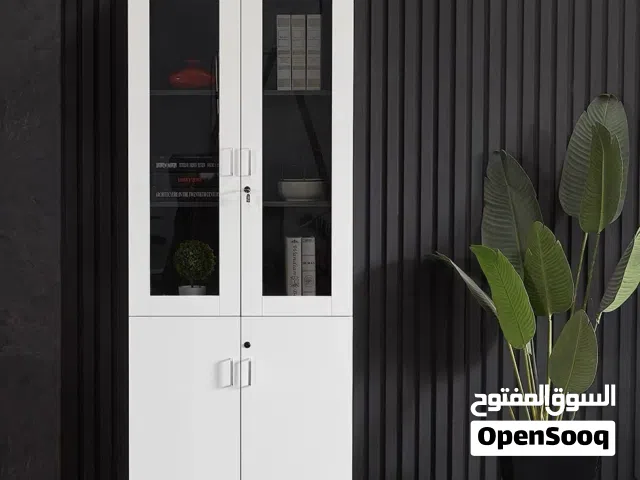 This is a lockable white and gray office storage cabinet with glass and solid doors