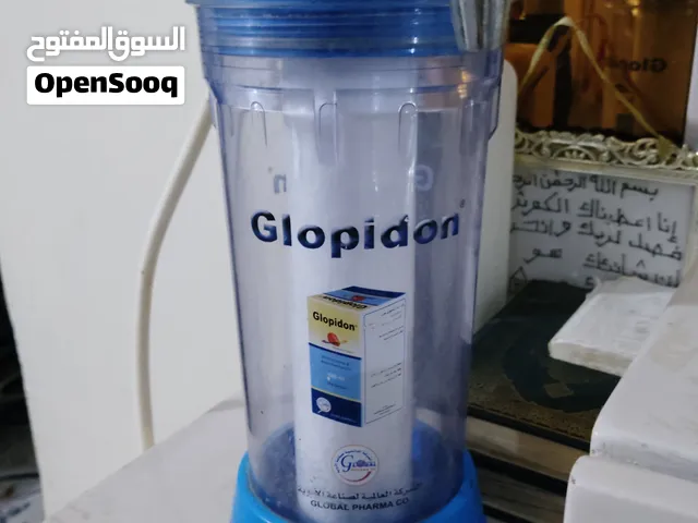 عرطة - فلتر/مضخة مياه يدوية بخزان وصنبور نظيف جدا