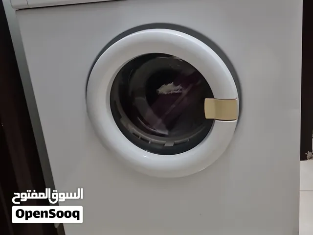 نشافة جنرال الكتريك حالتها ممتازة مخزنة وغير مستعملة الا عدد مرات قليلة جدا