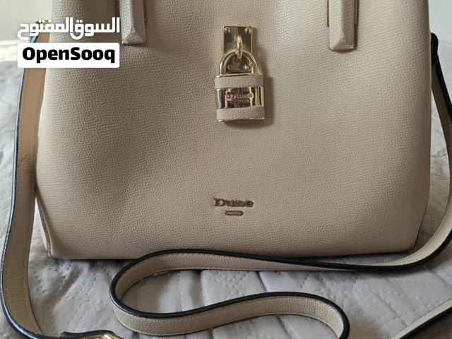 شنطة يد نسائية،ماركة ديون