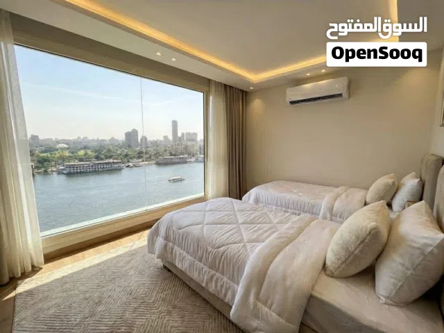 وحدة فندقية عـ النيل والاهرامات متشطبة ومفروشة بأعلي مستوي متأجرالك بعقد موثق شهريآ 110ألف