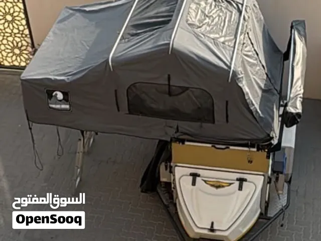 Compact Off-road Camper Trailer with Roof Tent and Storage Boxes