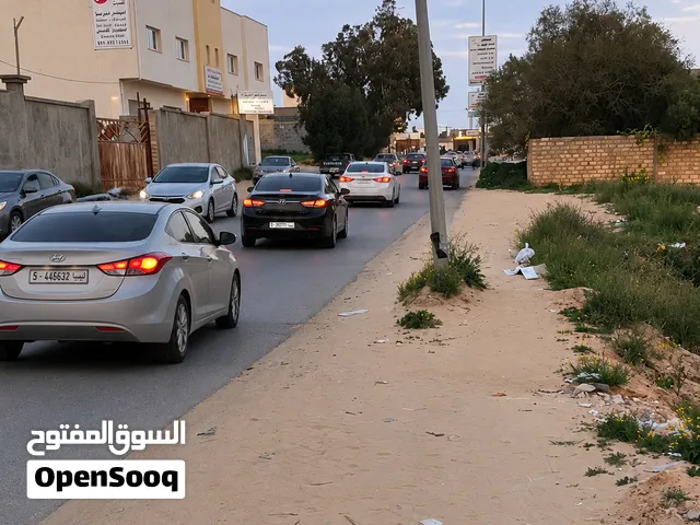 ارض تجارية بموقع ممتاز جدا في الباعيش بالقرب من مثلث موسى كوسى واجهة ممتازة  مناسبة للاستثمار