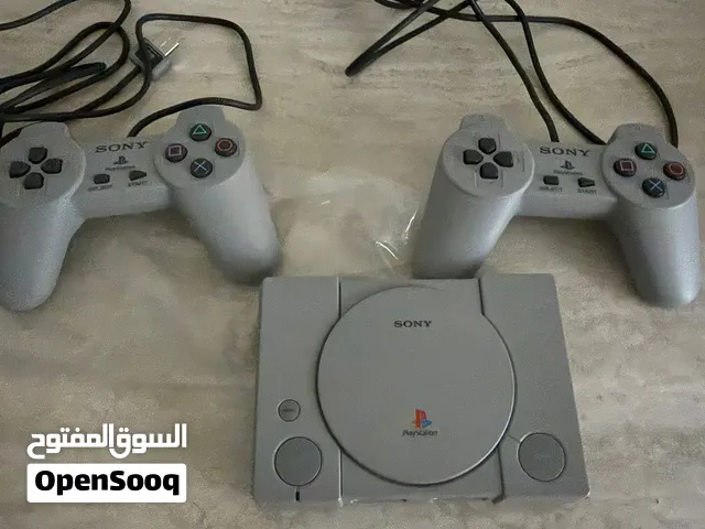 PlayStation Classic with both controllers