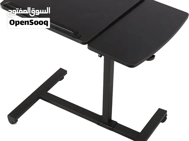 طاولة لابتوب خشبية مدمجة بعجلات لسهولة الحركة مع تحكم بالميلان والعرض لفترة محدودة والتوصيل مجاني