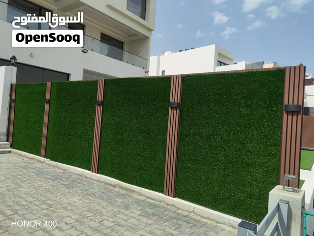 بديل الخشب مع الاضاءه مع العشب الصناعي حدائق نحن ارخص الاسعار