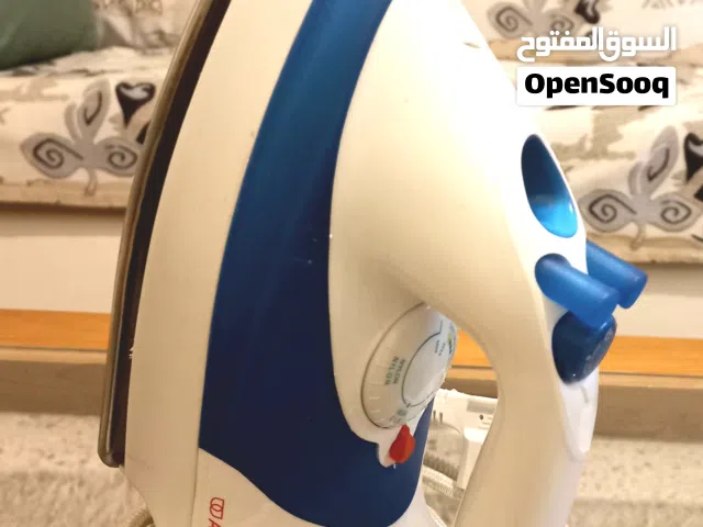 مكواة بخار ألكون