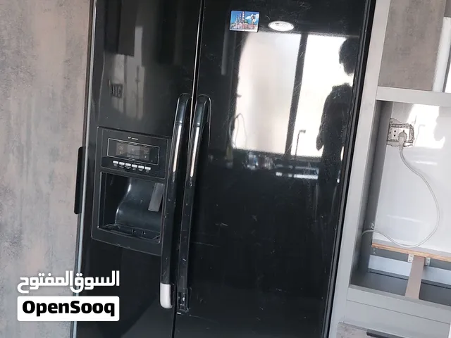 ثلاجة whirlpool بابين اصلية مستعملة بسعر مميز