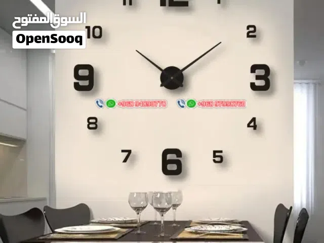 ساعة حائط ، الوان مختلفة ، يتوفر توصيل