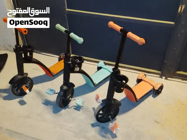 دراجات+ سكوترات اطفال 2×1