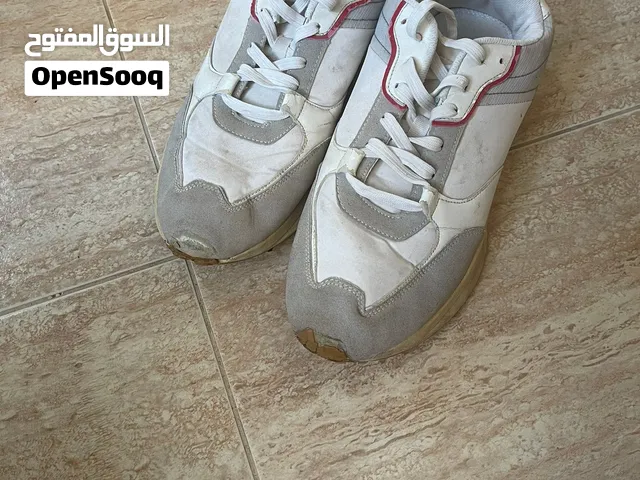 White sneakers with high sole