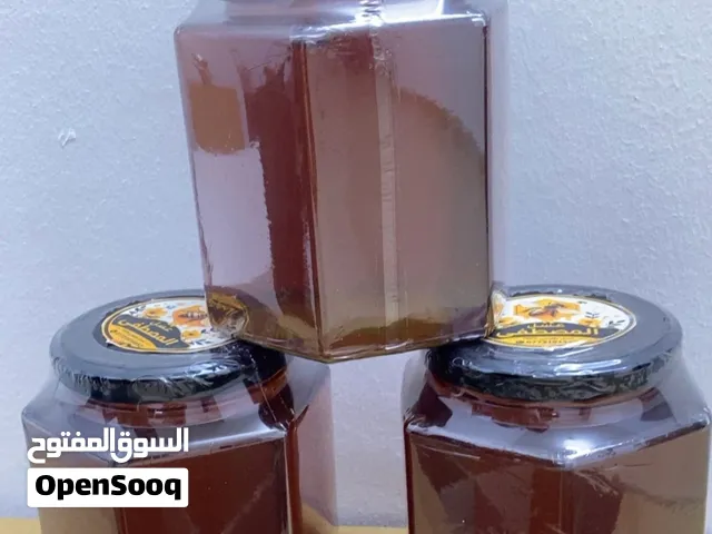 عسل وشمع بالعسل الأصلي الطبيعي للبيع