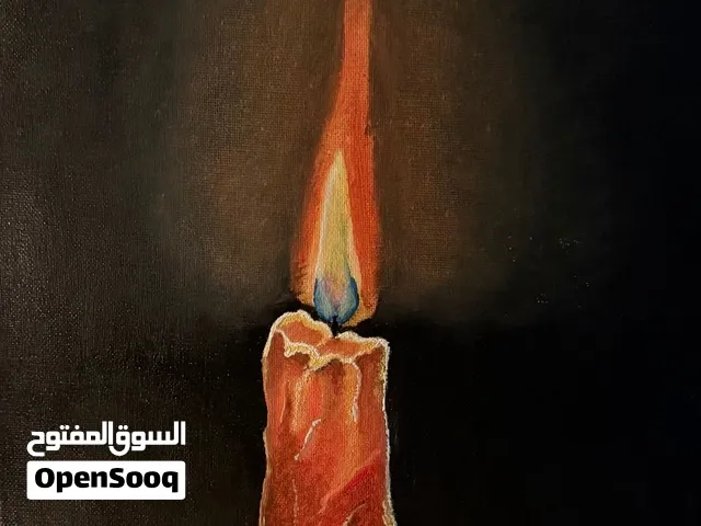 handmade painting of a lighted candle in a dark background