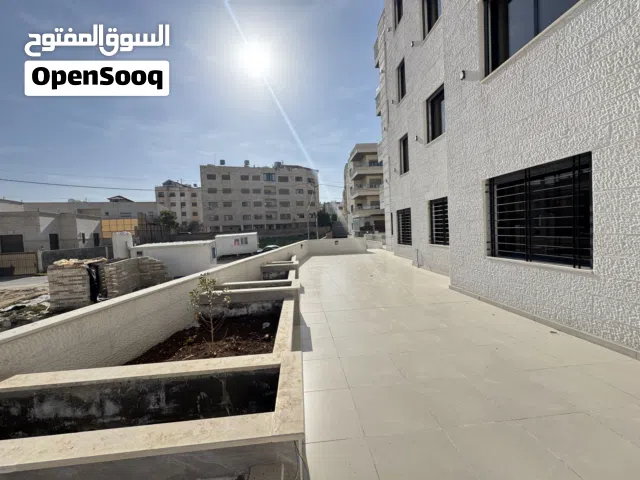 شقة طابق أرضي في مرج الحمام طريق المطار قرب كازية المناصير الظهير ومدارس العقيق من المالك مباشرة