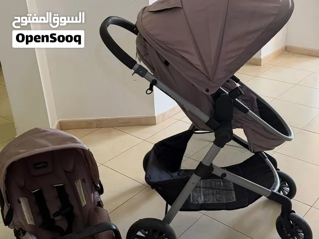 عربة أطفال مع كرسي سيارة من evenflow