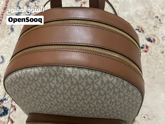 ماركه مايكل كورس جديده اصليه 100%