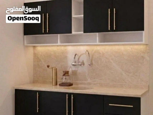 كاونتر خشب مترين ارضي وملحق مع سنك متر وعشرين مرمر مع مجرات السعر 325