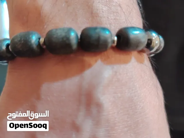 اسوار من خرز العنبر والفواصل فضه وخرز الحجر الصيني
