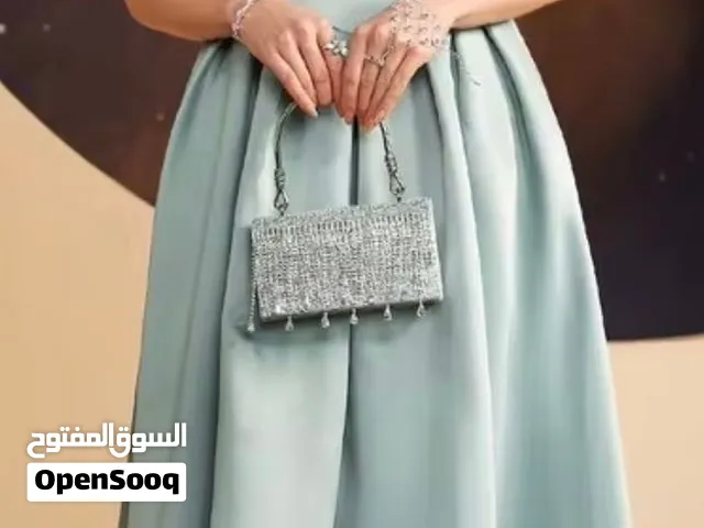 فستان لونه ف الحقيقه اخضر نعناعي ملبوس مره