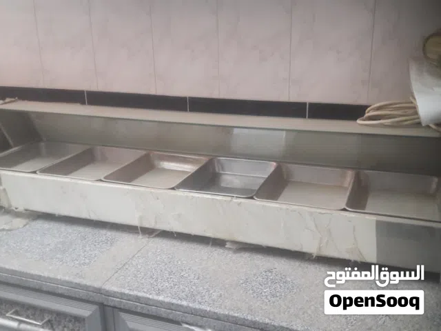 سخان مياه لجعل صواني الطعام دافئة