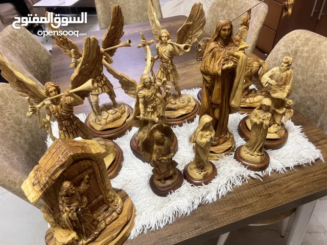 تماثيل خشب زيتون نحت يدوي احجام وأوزان مختلفة