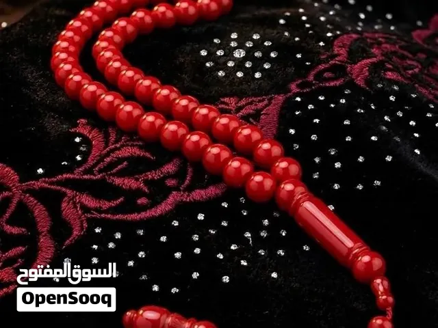 مسباح أحمر فاخر بكلايت – قطعة مميزة للذوق الرفيع