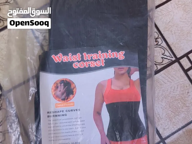 مشد بطن نسائي (كورسية بطن)