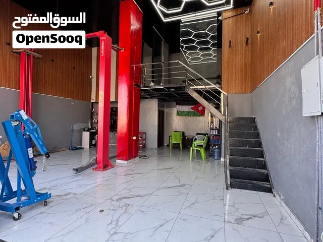مركز صيانة وتعديل مركبات مجهز بالكامل – للبيع أو للضمان