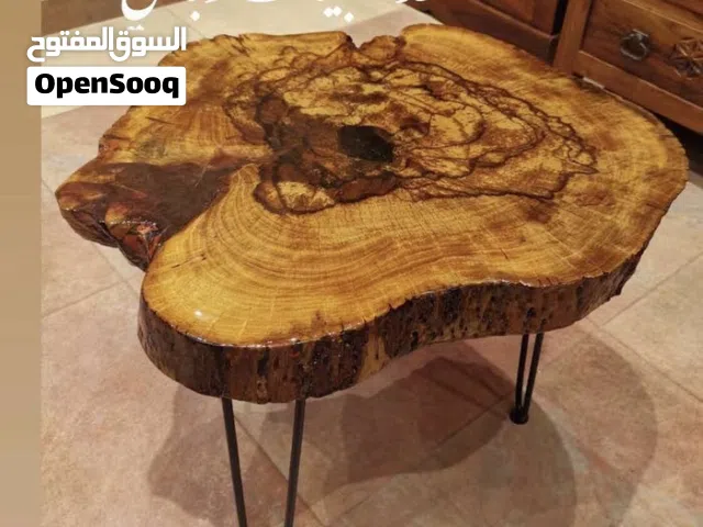 طاولات خشبيه من الخشب الخام