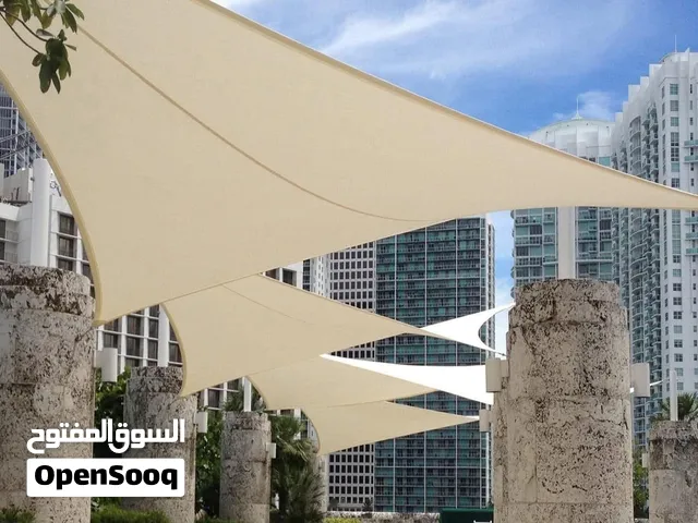 مظللات أشرعة برجوله مظللات متحركه القماش كوري مكفول اقل الاسعار  وافضل خدمه